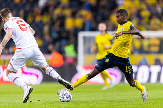 Heini Vatnsdal of Faroe Islands and Alexander Isak of