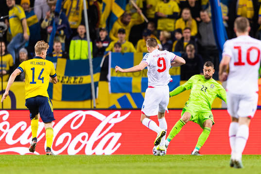 Gilli Rólantsson of Faroe Islands with a chance to score