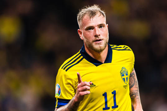 John Guidetti of Sweden celebrates scoring 3-0