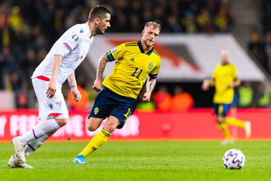 Atli Gregersen of Faroe Islands and John Guidetti of Sweden