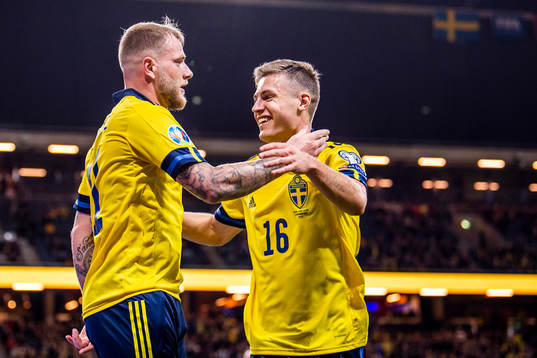 John Guidetti and Mattias Svanberg of Sweden celebrates