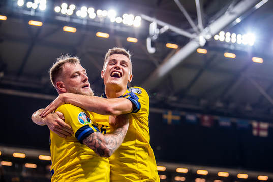 John Guidetti and Mattias Svanberg of Sweden celebrates