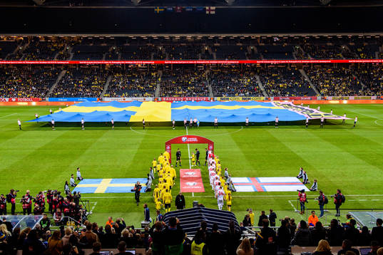 The players of Sweden and of Faroe Islands make their