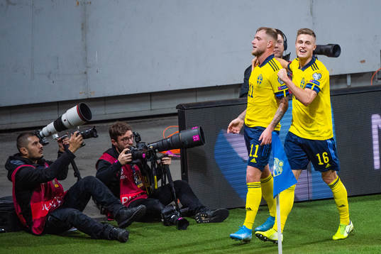 John Guidetti and Mattias Svanberg of Sweden celebrate the