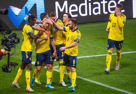 Players of Sweden celebrate the 3-0 goal by John Guidetti