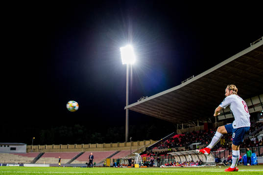 Iver Fossum of Norway takes a corner kick