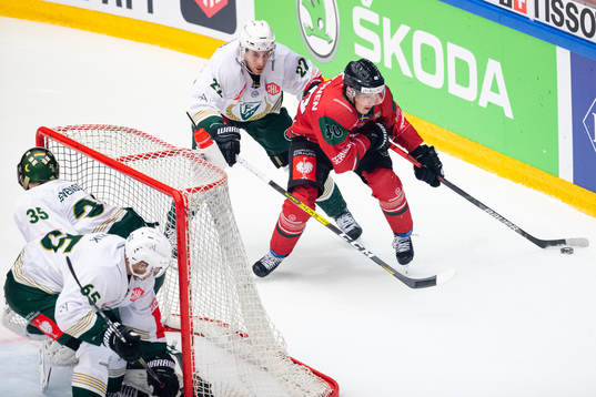 Per Åslund of Färjestad and Joel Mustonen of Frölunda