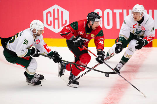 Martin Johansson and Johan Ryno of Färjestad and Viktor