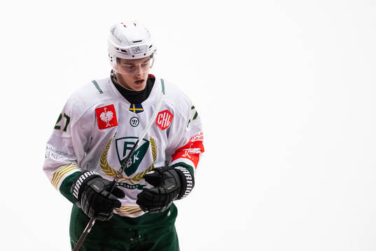 Oskar Bäck of Färjestad looks dejected