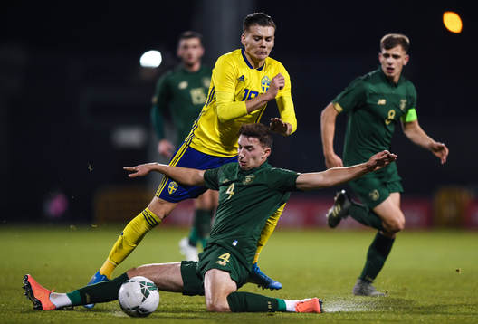 19 November 2019; Jake Larsson of Sweden is tackled by