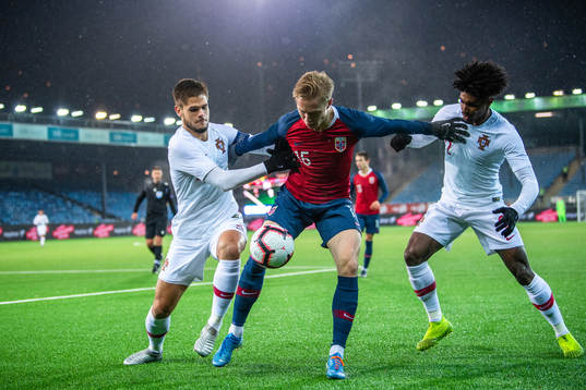 Ola Brynhildsen of Norway against Diogo Queiros and Thierry