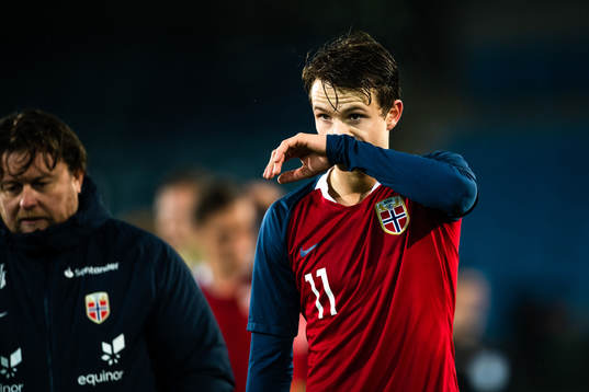 Håkon Evjen of Norway looks dejected