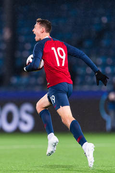 Jørgen Larsen of Norway celebrates scoring 2-3
