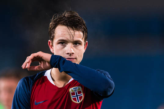 Håkon Evjen of Norway looks dejected