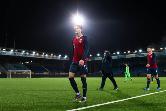 Håkon Evjen of Norway looks dejected