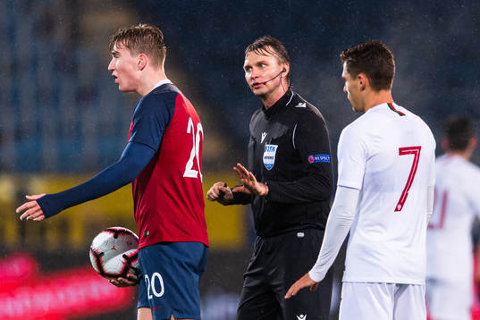 Kristian Thorstvedt of Norway reacts against referee Segei