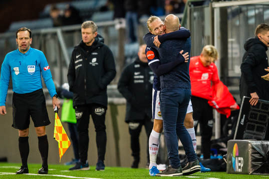 Lars-Jørgen Salvesen of Strømsgodset and Henrik Pedersen,