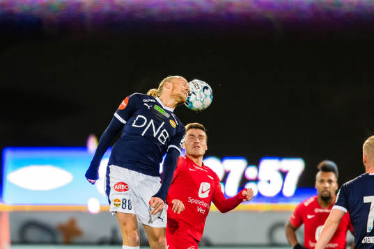 Lars-Jørgen Salvesen of Strømsgodset and Ruben Yttergård