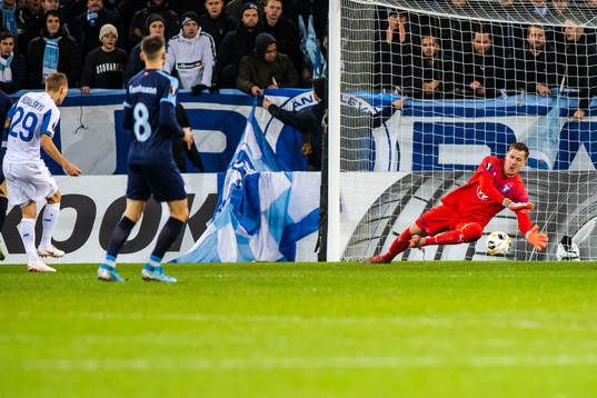 Goalkeeper Johan Dahlin of Malmö FF with a save