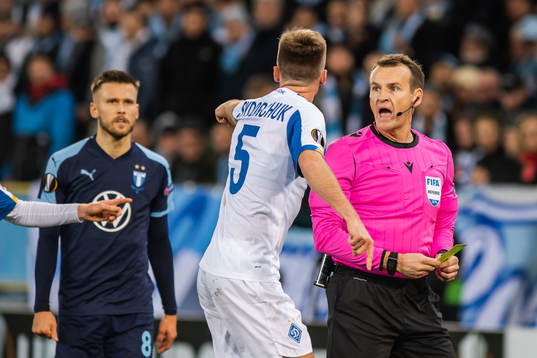 Serhiy Sydorchuk of Dynamo Kiev reacts against referee