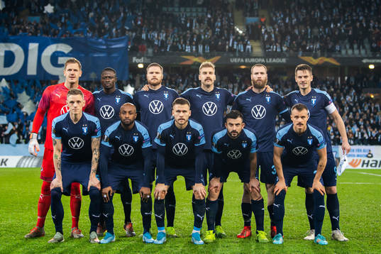 Players of Malmö FF pose for a team group photo