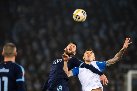 Erdal Rakip of Malmö FF and Mykola Shaparenko of Dynamo