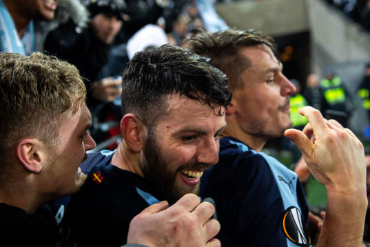 Erdal Rakip and Markus Rosenberg of Malmö FF celebrate
