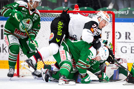 Malmö Redhawks Lars Bryggman och Rögles Erik Andersson