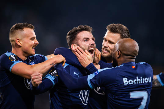 Erdal Rakip celebrate with Eric Larsson, Arnor Traustason