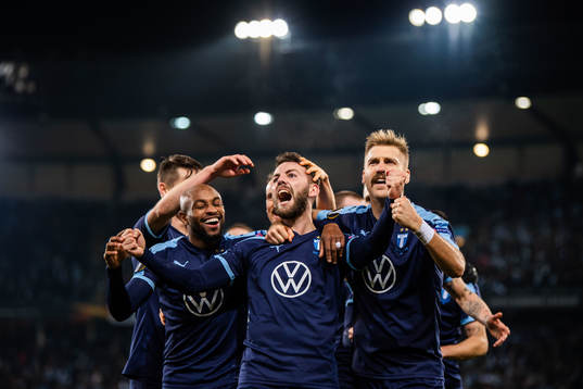 Erdal Rakip of Malmö FF celebrate with teammates