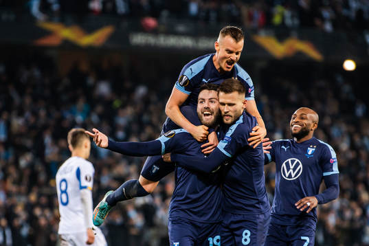 Erdal Rakip of Malmö FF celebrate with Arnor Traustason,