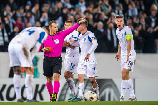 Serhiy Sydorchuk of Dynamo Kiev is shown a red card from