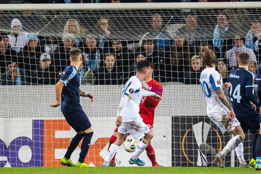 Benjamin Verbic of Dynamo Kiev scores 3-3 behind goalkeeper