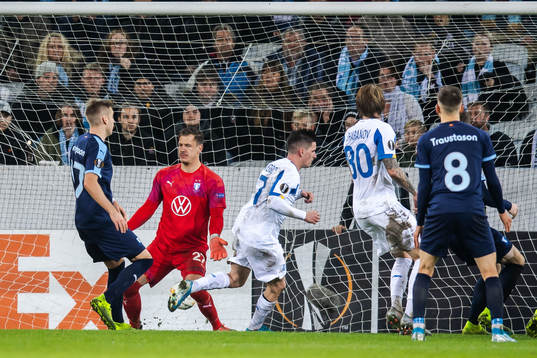 Benjamin Verbic of Dynamo Kiev scores 3-3 behind goalkeeper