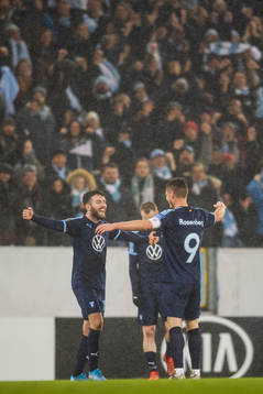 Erdal Rakip and Markus Rosenberg of Malmö FF celebrate