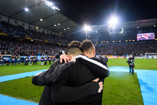 Markus Rosenberg of Malmö FF hugs Johan Dahlin and Behrang