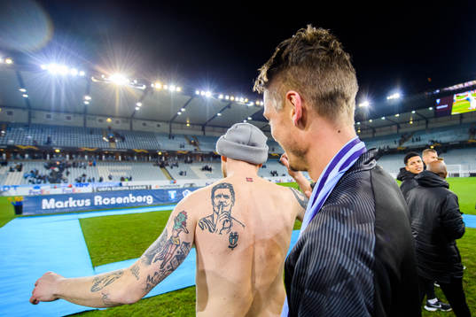 Markus Rosenberg of Malmö FF with a supporter that has a