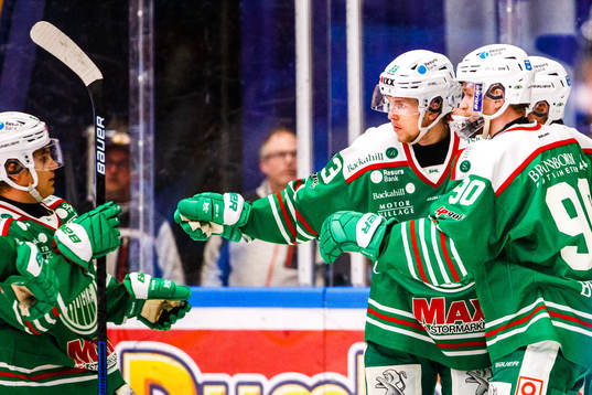 Rögles spelare jublar