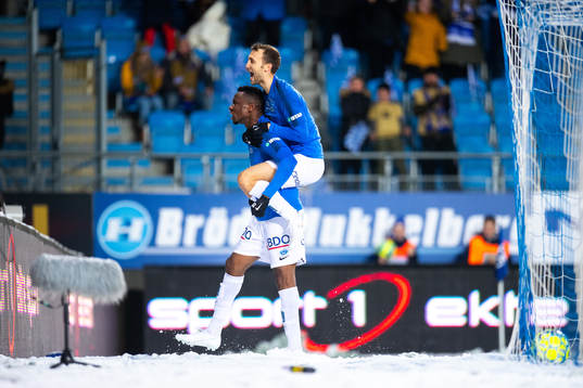 Leke Samson James and Magnus Eikrem of Molde celebrate the