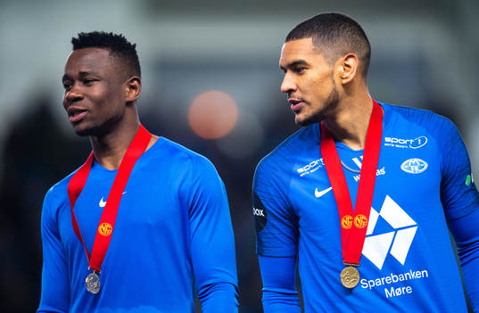 Leke Samson James and Ohi Omoijuanfo of Molde with their