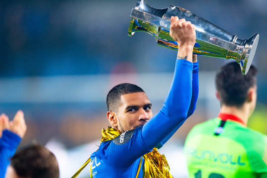 Ohi Omoijuanfo of Molde celebrates with the trophy