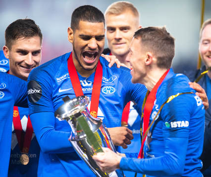 Ohi Omoijuanfo and Mattias Moström of Molde celebrate with