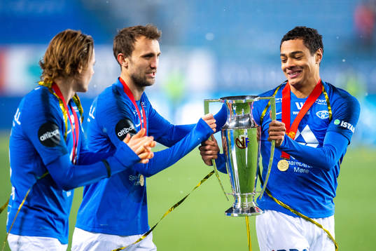 Magnus Eikrem of Molde celebrates with the trophy