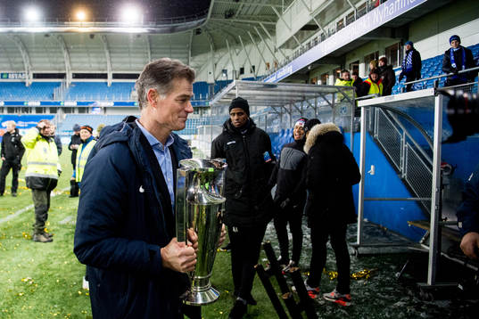 Øystein Neerland, sports director of Molde, with the trophy