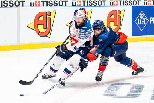 Andrew Bodnarchuk of Red Bull Munich and Anton Hedman of