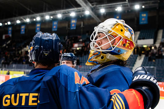 Mattias Guter and goalkeeper Karri Rämö of Djurgården