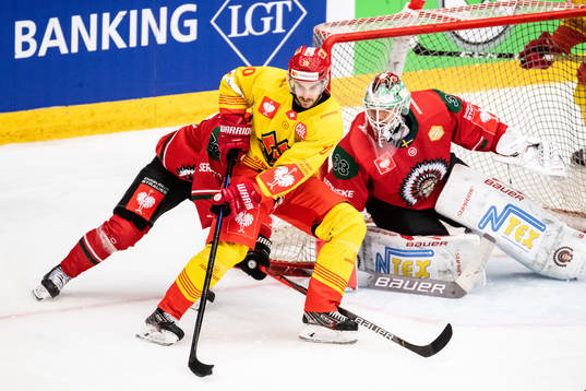 Luca Cunti of Biel-Bienne and goalkeeper Johan Mattsson of