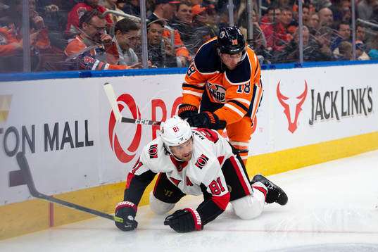 Ron Hainsey of the Ottawa Senators and James Neal of the