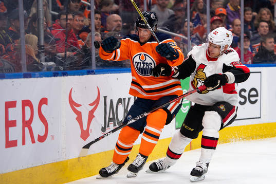Gaetan Haas of the Edmonton Oilers and Nikita Zaitsev of