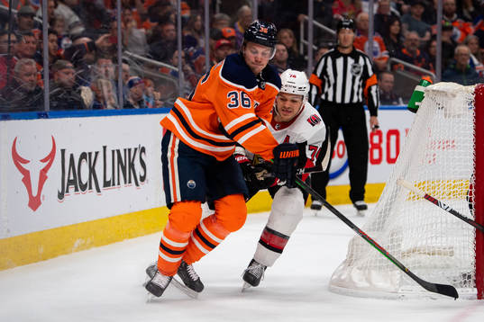Joel Persson of the Edmonton Oilers and Mark Borowiecki of